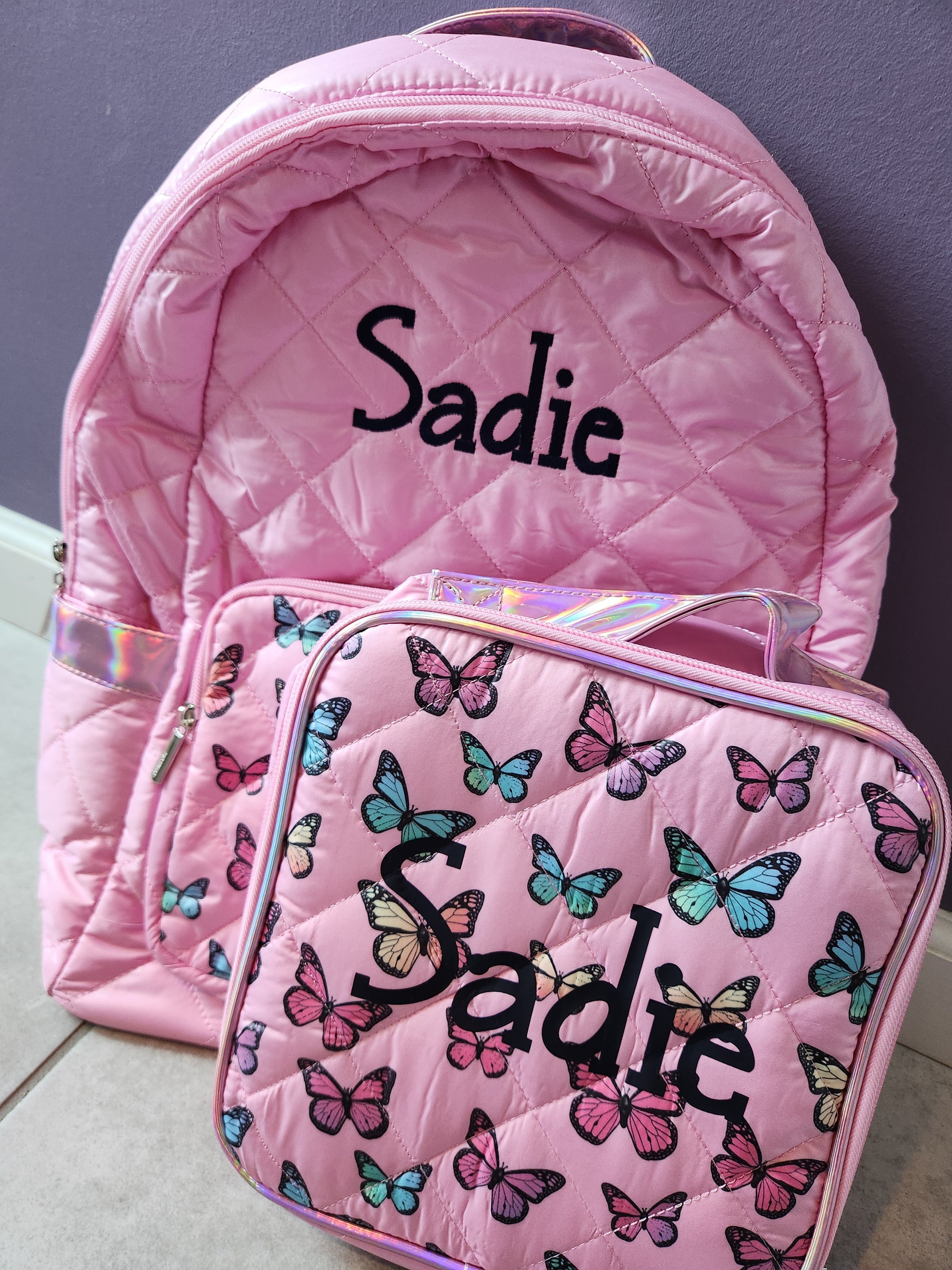 Puffer pink backpack with butterfly pocket