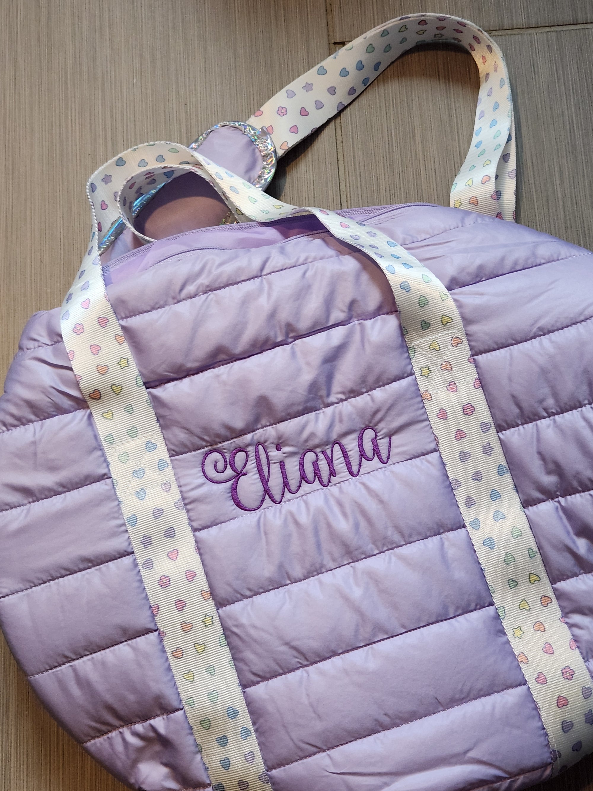 Purple Puffer Duffle with Rainbow Heart Strap